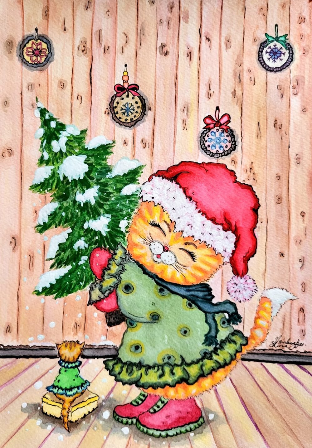 Christmas card of a cat in a Santa hat