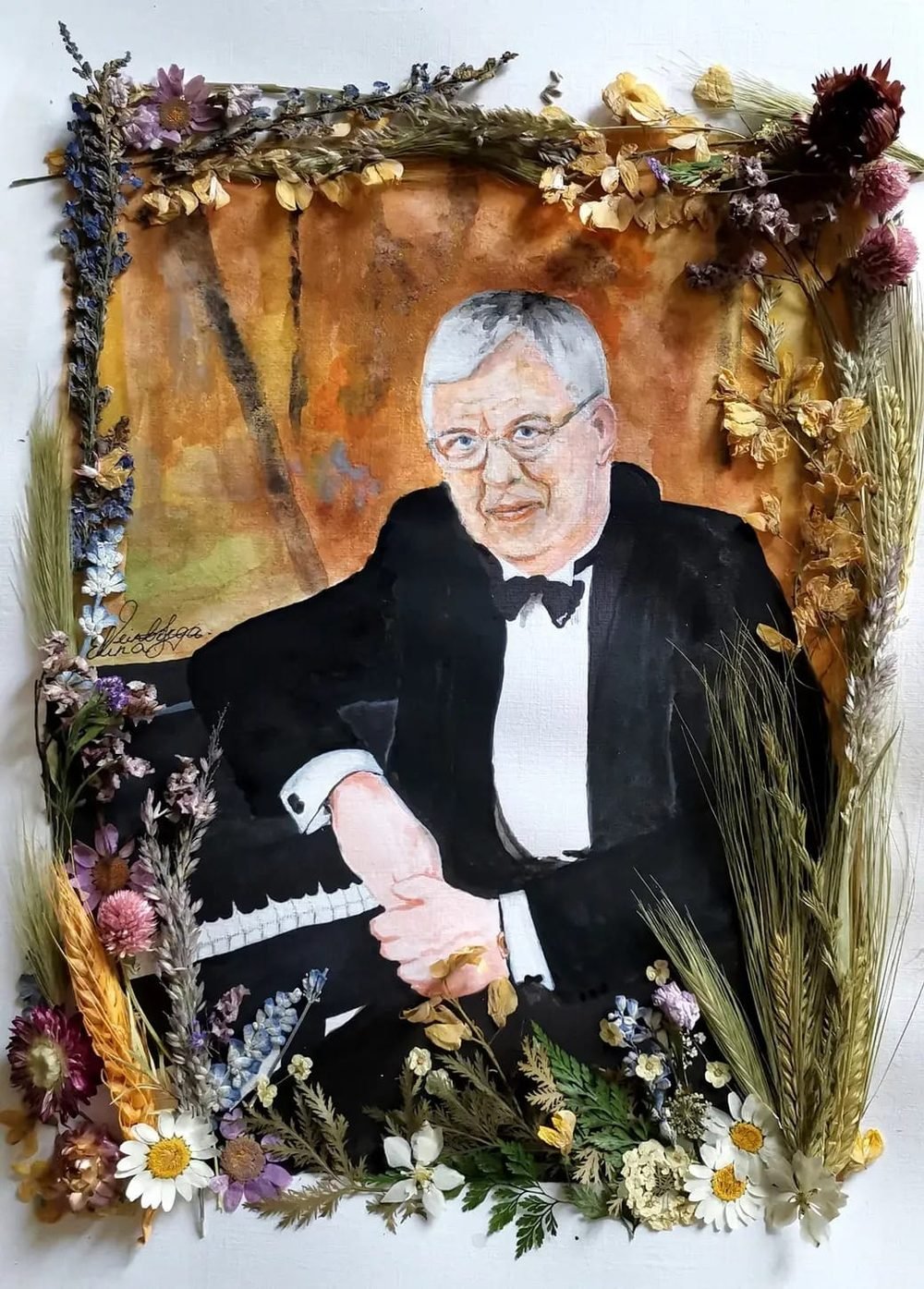 Portrait of an elderly gentleman framed with pressed flowers